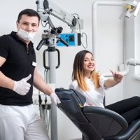 Woman happy in dental chair at Castle Hills dentist.