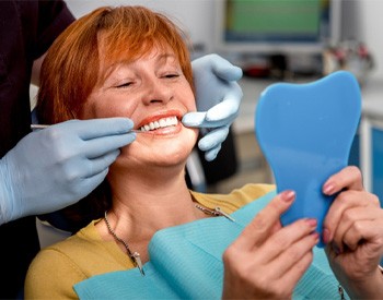 patient receiving dentures in San Antonio. 