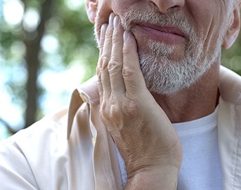 Man with a toothache in San Antonio