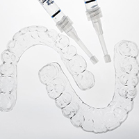 take-home whitening trays and bleaching gel 