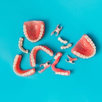 Variety of dentures against blue background