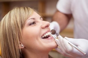 woman receiving a dental exam