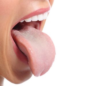 Woman sticking out her tongue