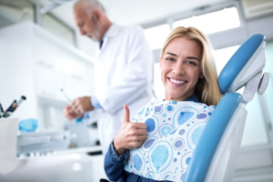 a woman visiting her cosmetic dentist